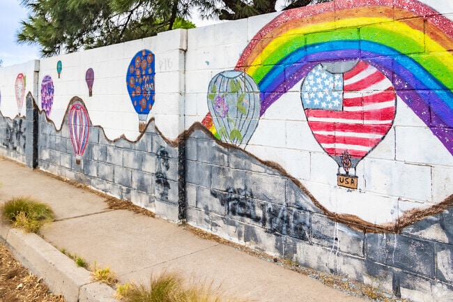 Murals on Hodgin Street show pride in Albuquerque's balloon festivals.