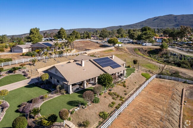 Bungalows and single-level homes line North Victoria Drive in Alpine.