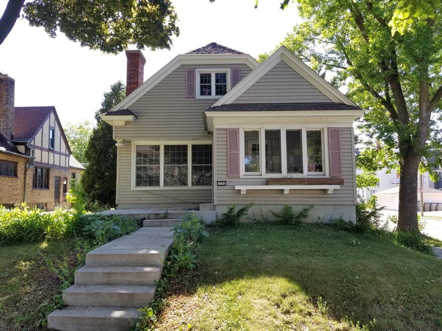 Front of house with enclosed porch