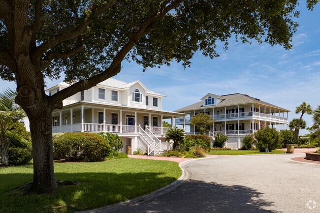 Large new construction homes in Tybee Island feature wrap around porches.