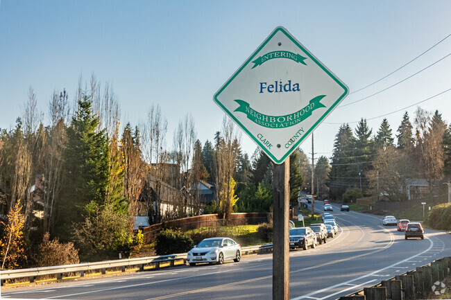 A Felida sign marks the edge of the Felida-Starcrest neighborhood along NW 36th Ave.