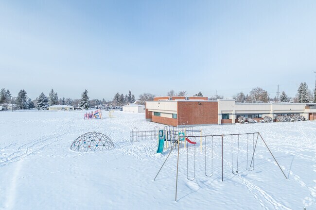 Broadway Elementary features a small playground for its students.