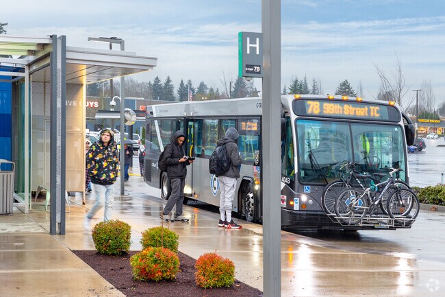 Commuters board the train at the Vancouver Mall station in Minnehaha.