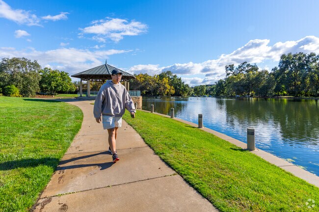 Enjoy a stroll through Village Green Park in Serrano Village.