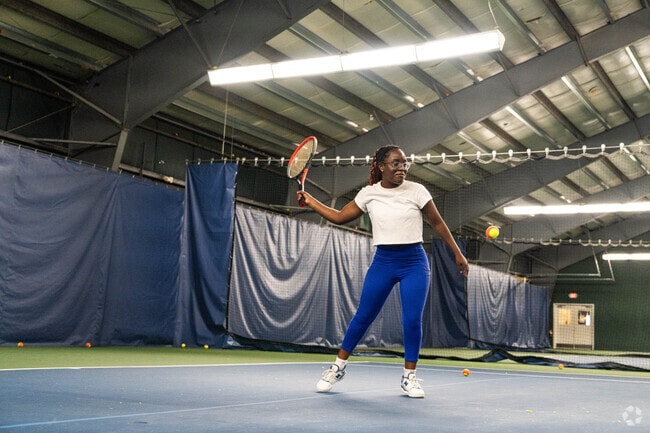 Residents enjoy the Sportsmen’s Tennis & Enrichment Center in Franklin Field North.