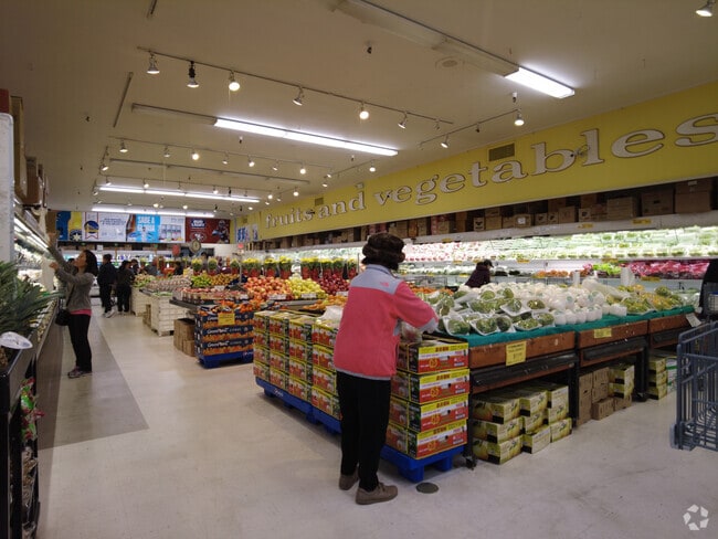 Harvesting freshness at Marina Grocery in Hellyer neighborhood.