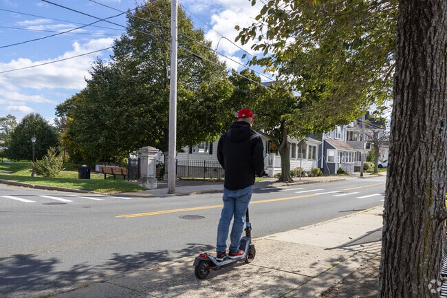 Residents of Court Park enjoy spacious sidewalks for riding scooters.