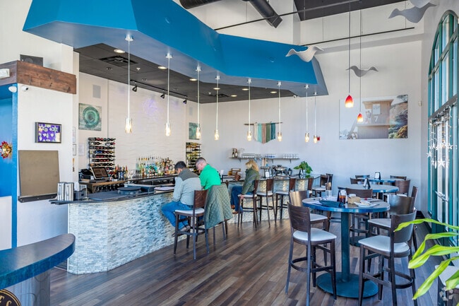 Trestles Coastal Cuisine in Castle Pines offers indoor seating filled with natural light.