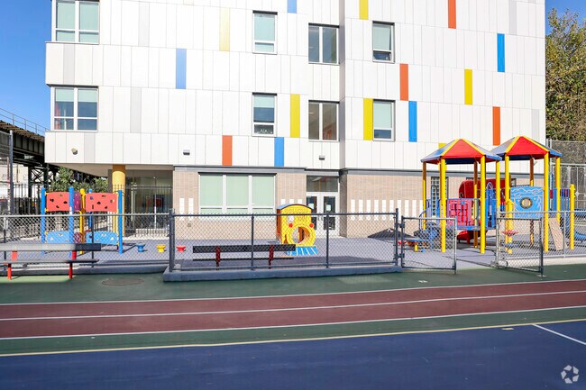 PS 33 Timothy Dwight where children enjoy the outside play on a beautiful day.