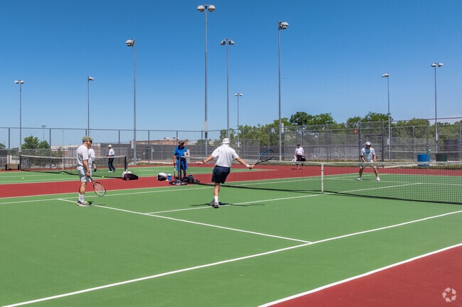 Meet up with friends for a game of tennis on one of the four courts at Barry Road Park.