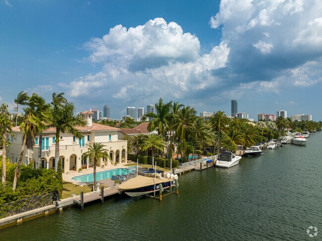 Beautiful waterfront mansions in The Waterway’s neighborhood have luxurious vessels docked.
