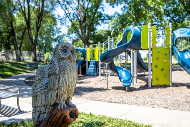 Belle M Turner Park combines the joy of play and beautiful carved sculptures in Highland Park.