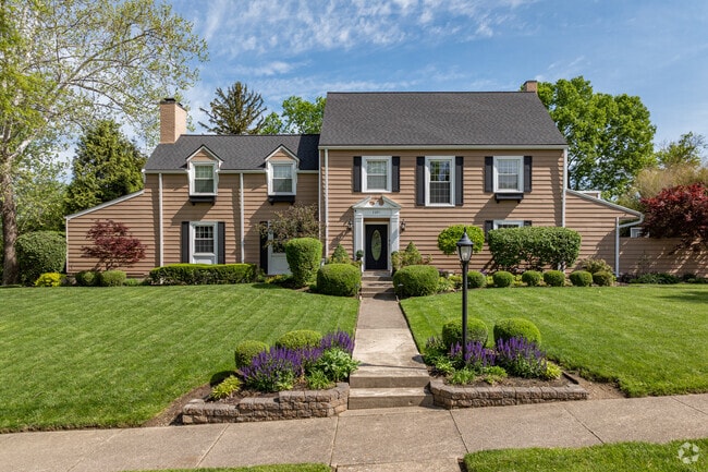 Colonial Revival homes in Euclid Heights-Runnymede often reside on large lots.