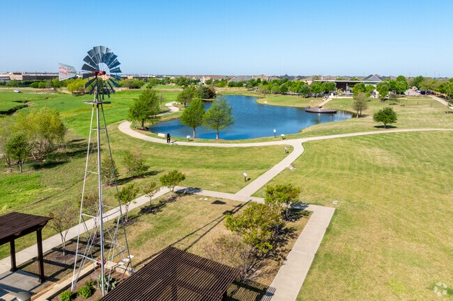 Local gather for community events and gardening at The Commons in Windsong Ranch.