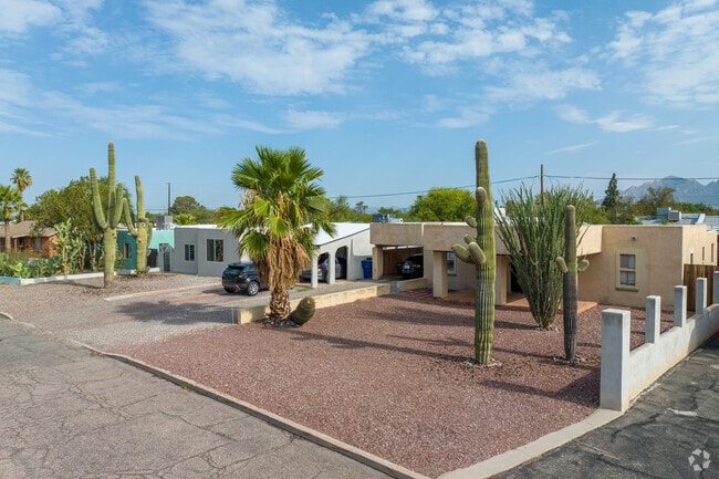 Midcentury Pueblos in Mountain First Avenue offer carport-covered driveways.