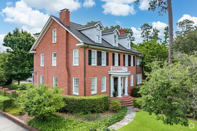 A home in Forest Hills North showcases Greek Revival architecture.