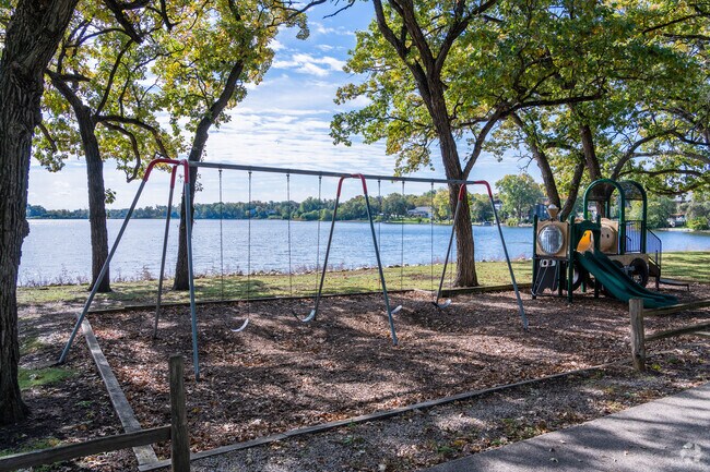 A playground at the north end of Miltmore Lake is for shared use for Venetian Village residents.