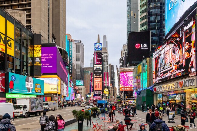 Broadway theaters and shops attract visitors.