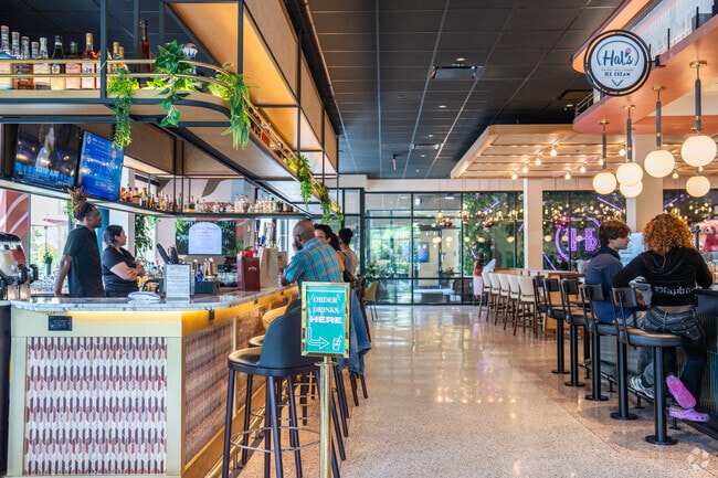 You can try many restaurants or enjoy a drink at the bar in Halidom Eatery, a nearby food hall.