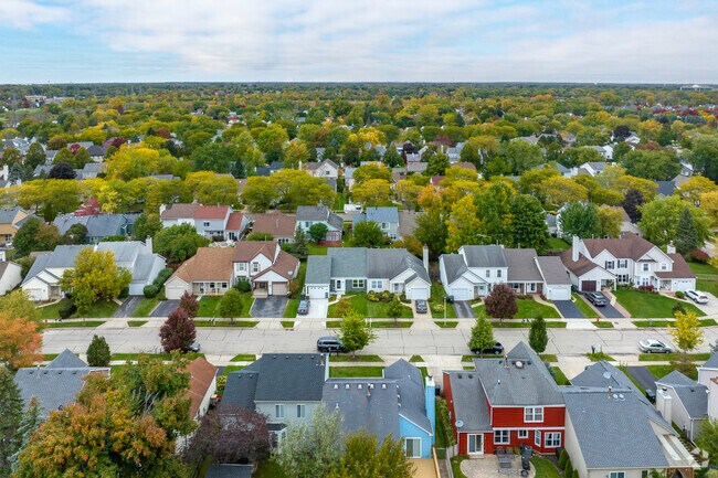 The homes of Cambridge Chase are nestled amongst full grown, mature trees.