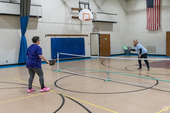 The Humble Park community center has pickleball courts and sports fields.