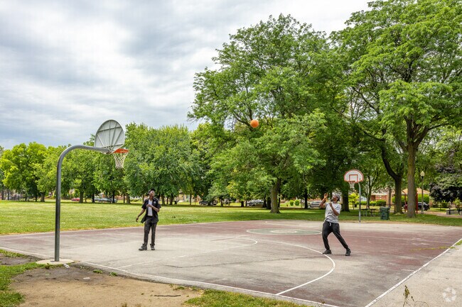 Nat King Cole Park has a full-court basketball court to shoot some hoops.