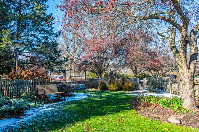 Relax on a bench in Foster Park's gardens in Indian Village.