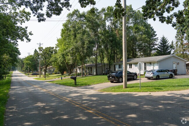 A mix of ranch and split-level homes line a quiet street in Bloomfield.