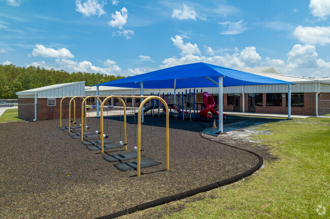 Cypress Elementary School has a large playground for children to enjoy during recess.