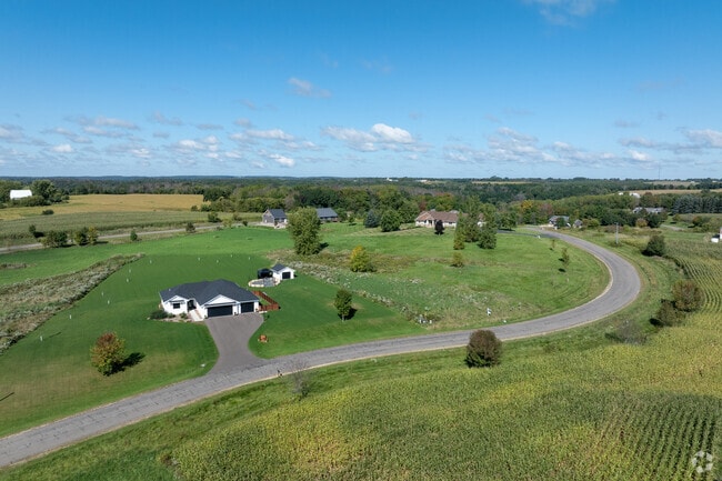 Homes on rolling acreage frame quiet drives outside Ellsworth.
