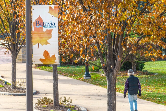 Tree-lined walkways connect Southeast Batavia neighborhoods to the river.
