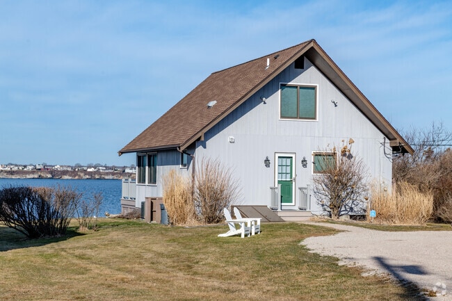 Waterfront Homes In the Beavertail Neighborhood Can Be Elegantly Simple On the Land Side.