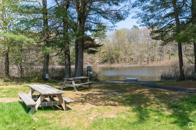 Photo of picnic tables and water access at the Nequasset Park in Woolwich, Maine.