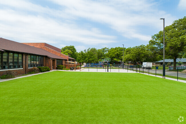 Classical School of Wichita has a large patch of turf for outdoor fun.