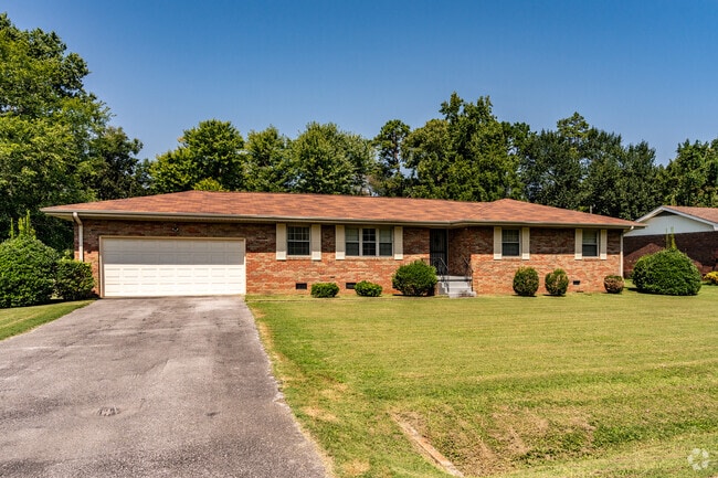 Brick ranch style homes are common in the Hickory Valley neighborhood.