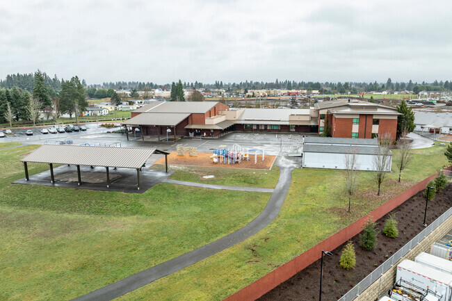 Orchards Elementary School has a covered area for basket ball and other recess games.