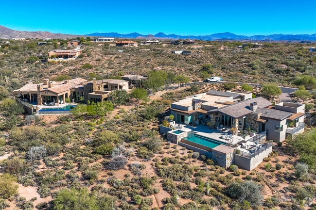 Many homes in Desert Mountain feature pools in the backyard in order to escape the heat.