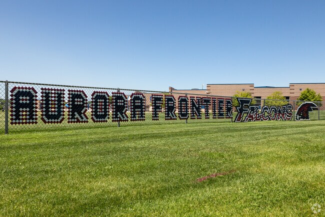 School spirit signs outside of Aurora Frontier K-8.