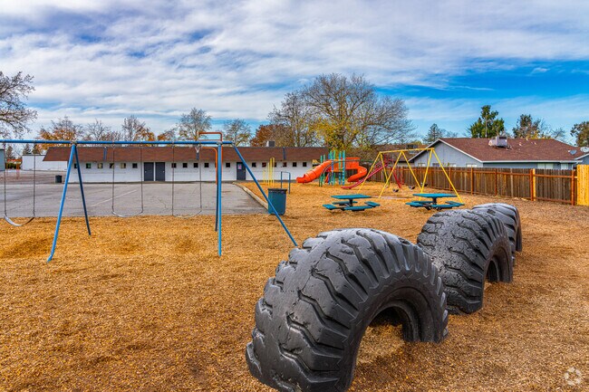 Large tires make perfect play equipment at Trinity Christian School.