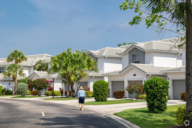 Fiddler’s Creek homes sit in peaceful neighborhoods with landscaped streets.