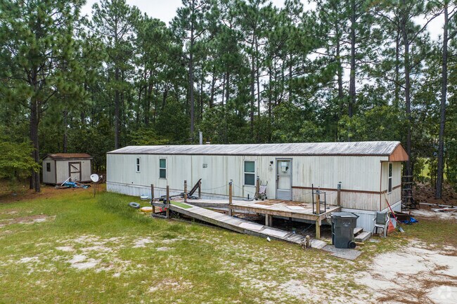 Mobile homes can be found on spacious wooded lots.