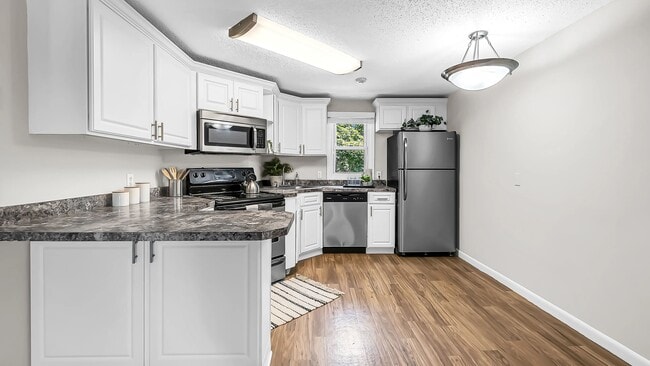 Our kitchens offer timeless white cabinetry and gleaming stainless steel appliances, which exude modern functionality with classic charm.