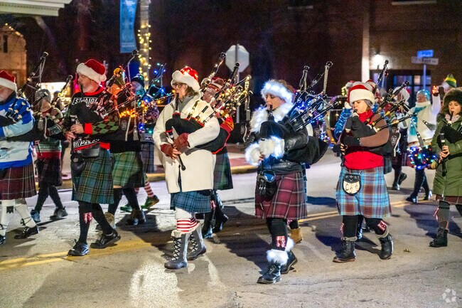 A bagpipe band participates in the annual Whitefish Bay Holiday Stroll and Parade in Bender.