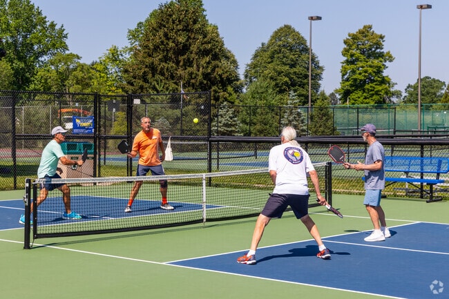 Friends rally on the pickleball courts at Veterans Park in Hamilton NJ—where fun and fitness come together.