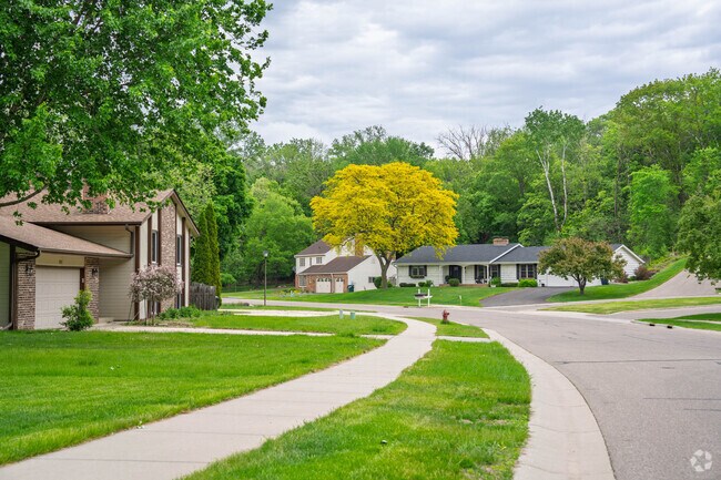 The streets in the Palomino Hills neighborhood are lined with sidewalks.
