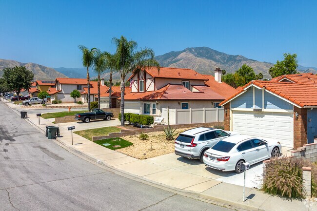Vibrant red-roofed Spanish-style homes line the streets of Crossroads.