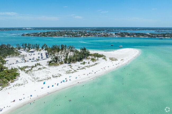 South Lido Park has a great peninsula shaped beach perfect for strolls and shell hunting.