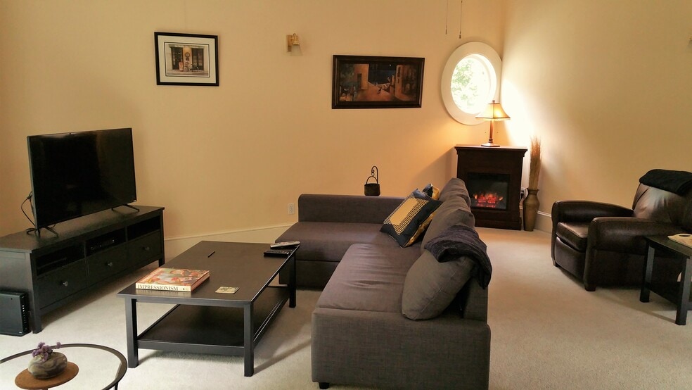 living area with fold out couch