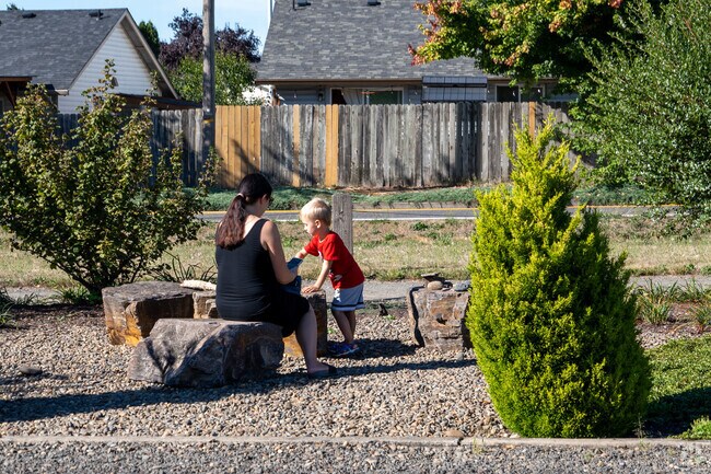 Families enjoy playing at First Place Park.