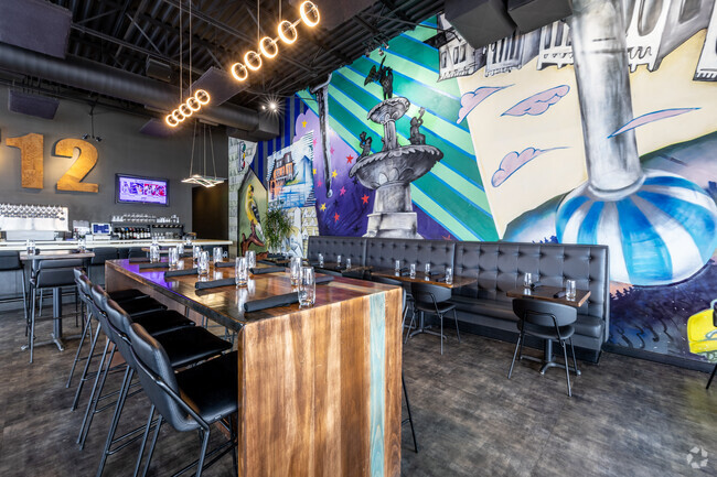 The colorful mural is a favorite at 712 Eat + Drink in the South Side.